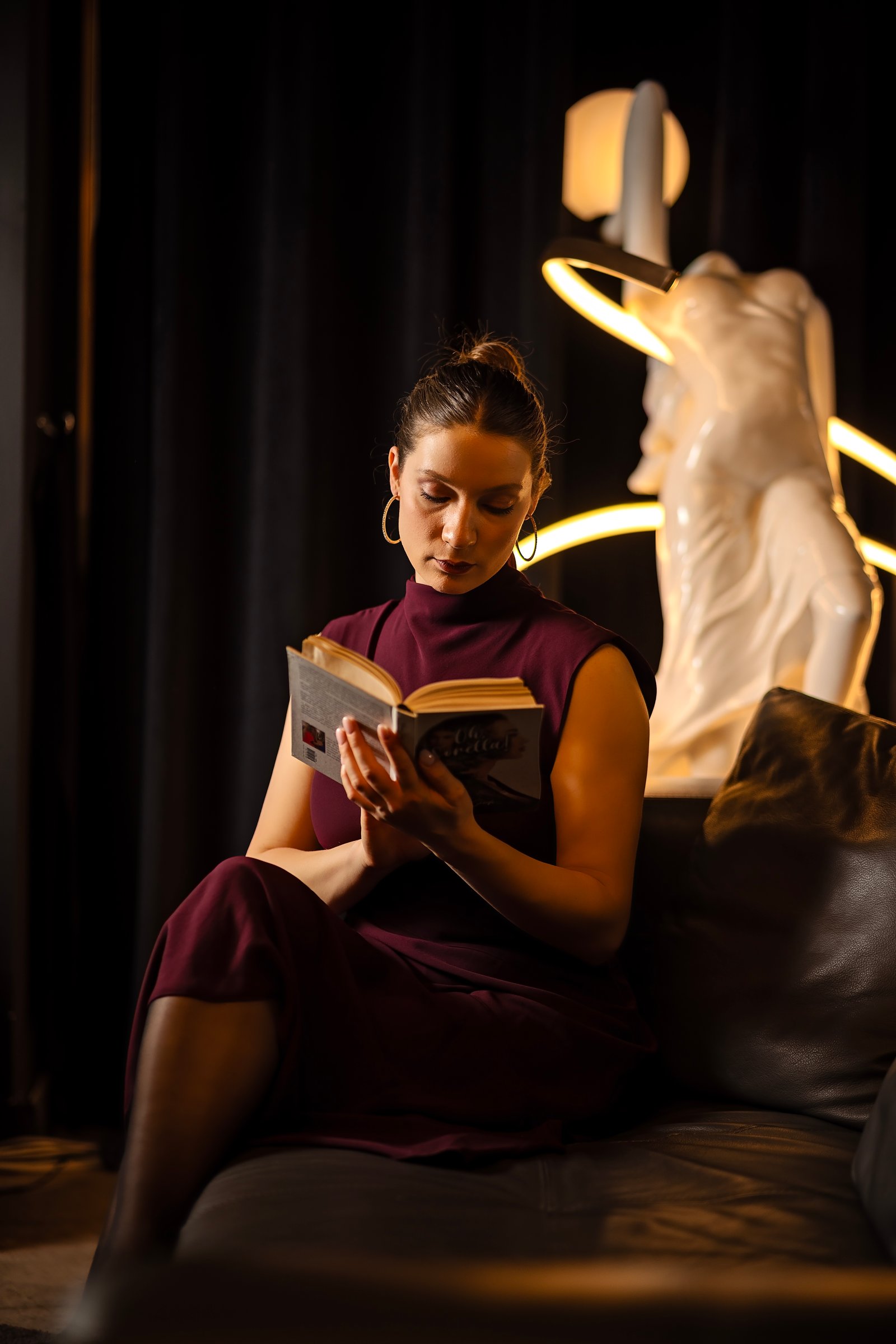 Premium Double Room interior — bed, headboard, and lighting